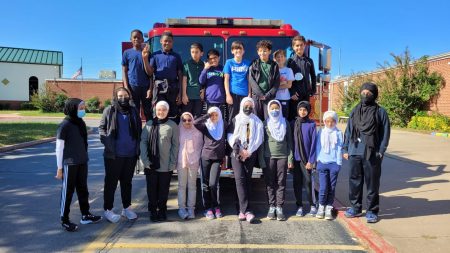 Photo of students with the fire truck
