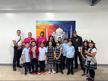 Photo of students with firefighters